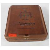 Hemingway wooden cigar box full of jewelry,