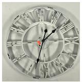 Metal decor clock, 23" across, works