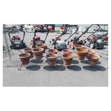Two arched flowerpot stands and 12 plastic flower