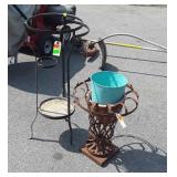 Two metal flower pot stands