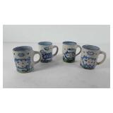 Four M.A. Hadley mugs, one is cracked, see