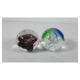 Two glass paperweights, one has damage, see