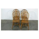 Four dining chairs, repaired in spots as shown