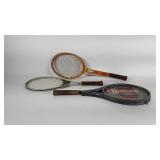 Three tennis rackets, one with cover, Wilson