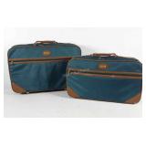 Pair of Jaguar suitcases, show wear, 22" × 13"