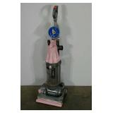 Dyson DC 07, pink, powers on but has a loud