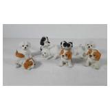 Eight Homco dog figurines, one has been repaired,