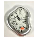 Melting wall clock approximately 11x14, battery