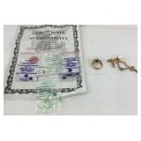 Four gemstones, plated ring, and watch chain