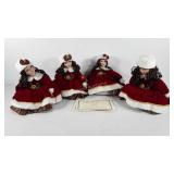 Four porcelain dolls, four Heritage Signature