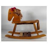 Wooden rocking horse, some paint stains and head