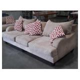 Sofa tan Microfiber upholstery with use as shown