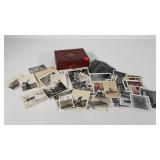 Box of family photos and negatives, dates appear