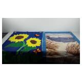 Two yard flags, sunflowers and beach scene