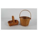 Two Longaberger baskets with protectors