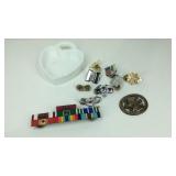 Military pins and a heart shaped dish