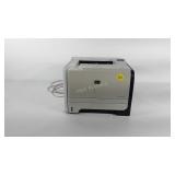 HP Laser Jet P2055dn printer, powers on, includes