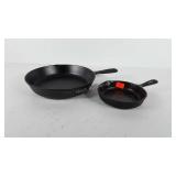Two cast iron skillets, includes 8.5" skillet and