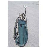 Golf club bag with 9 misc. Clubs