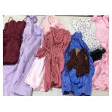 Six dresses and a skirt with vest,  all have