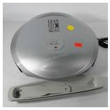 George foreman grilling machine, powers up