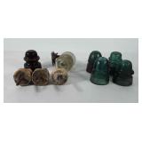 Glass and porcelain insulators, some have been