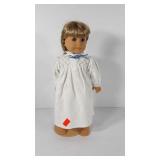 American Girl doll with stand