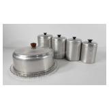 Aluminum canisters and glass cake plate with