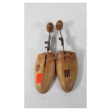 Wooden shoe stretchers, one marked Snyder &