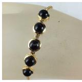 Black onyx and brass bolo bracelet 7.5in
