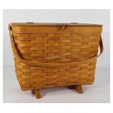 Longaberger magazine basket, footed with handle,
