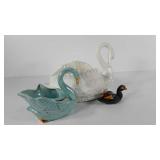 Two swan planter vases and a wooden duck, white