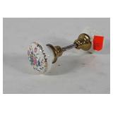 Porcelain and brass floral door knob
