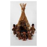 Native American doll house with five dolls, needs
