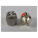 Two Napier coin banks, pig and owl, discoloration