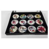 Twelve compact mirrors