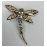 Dragonfly brooch with blue stones