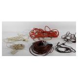 Group of extension cords and 1/4" drip tubing