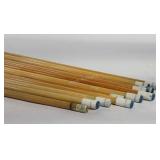 Group of pool sticks, one marked Champion