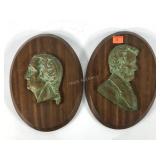 Cast metal profiles of Washington and Lincoln