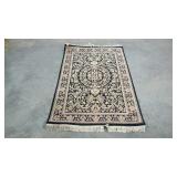 Throw rug, 39 x 63, needs cleaned