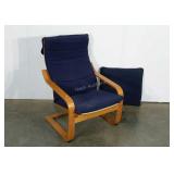 Cantilevered arm chair with extra pad