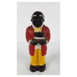 Cast iron Moses bank, stands 10" tall