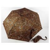 Windguard umbrella with flashlight in handle and