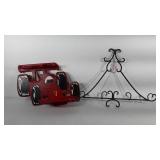Wall hangings, wooden racecar shelves and