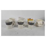 Seven coffee mugs, includes teacher themed mug,
