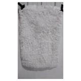 Fluffy white bath mat, approximately 27" x 44"