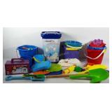 Beach toys, sand castle buckets, shovels, sand