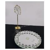 Glass decor includes lazy Suzanne with crystals.