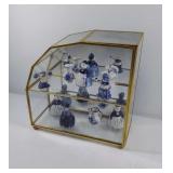Small brass and glass curio cabinet with 9 small